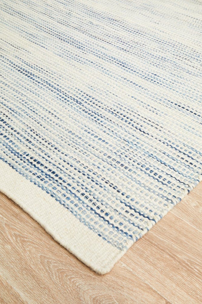 Navia Blue wool rug — side angle showing double-sided flatweave construction