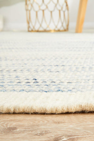 Navia Blue flatweave rug — detail shot of blue wool weave