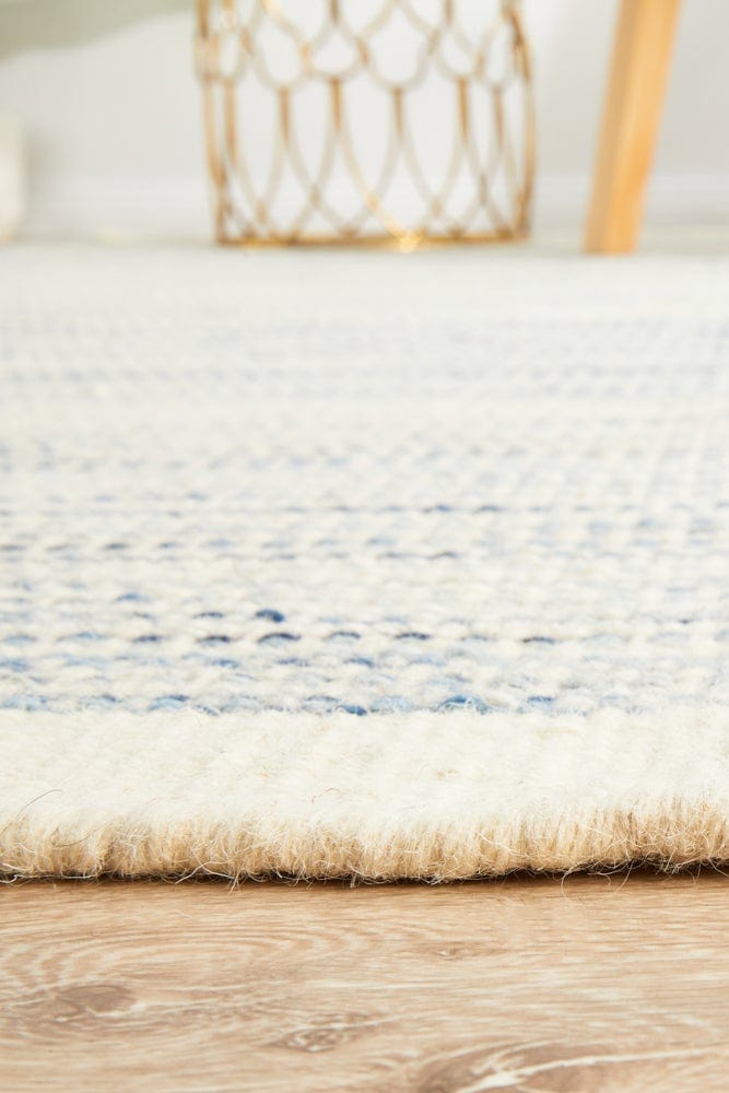 Navia Blue flatweave rug — detail shot of blue wool weave