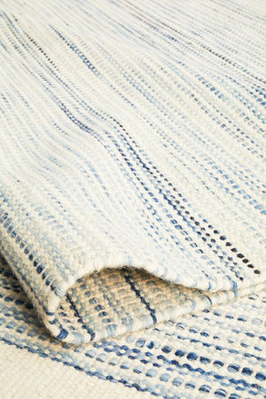 Navia Blue flatweave wool rug — product shot on white background