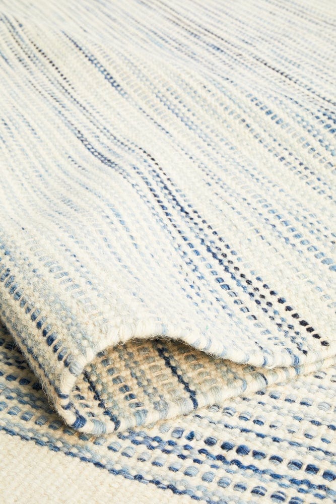 Navia Blue flatweave wool rug — product shot on white background