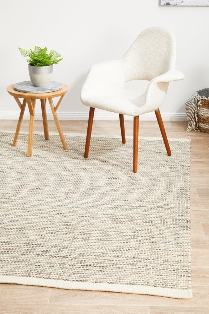 Navia Natural flatweave rug — close-up of natural wool weave detail