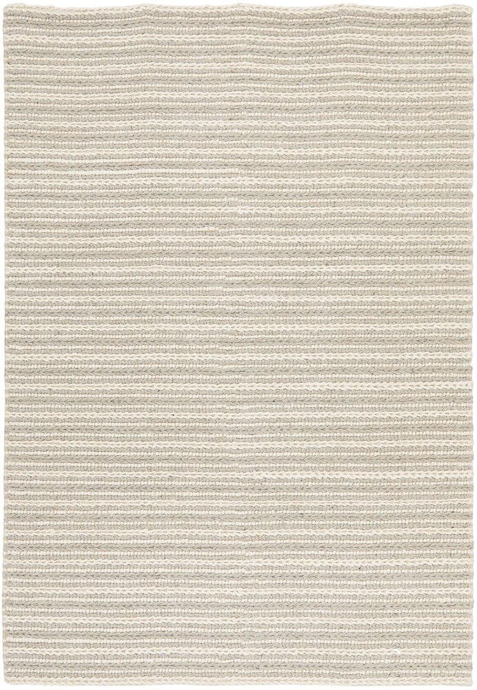 Navia 320 Grey rug styled in a contemporary minimalist bedroom