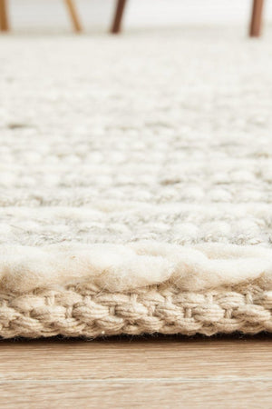 Navia 320 Grey flatweave rug — detail shot of grey felted wool construction