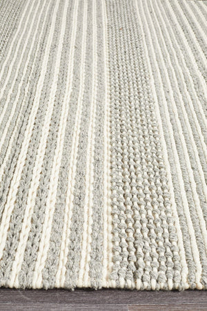 Navia 340 Silver wool rug — side angle showing 25mm felted pile depth