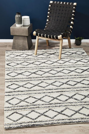Leka Textured white and grey wool rug — lifestyle shot in contemporary living room