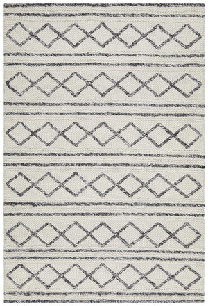 Leka Textured rug — top-down flat lay showing white grey dimensional weave pattern