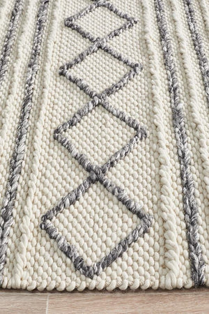 Leka Textured wool rug — side angle showing 10mm pile depth and textured surface